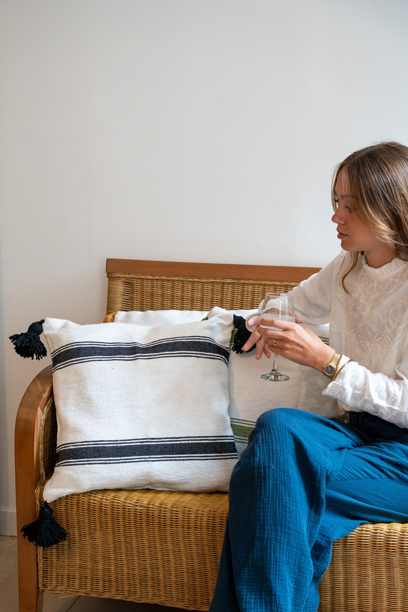 Housse de coussin en coton à rayures – finition pompons
